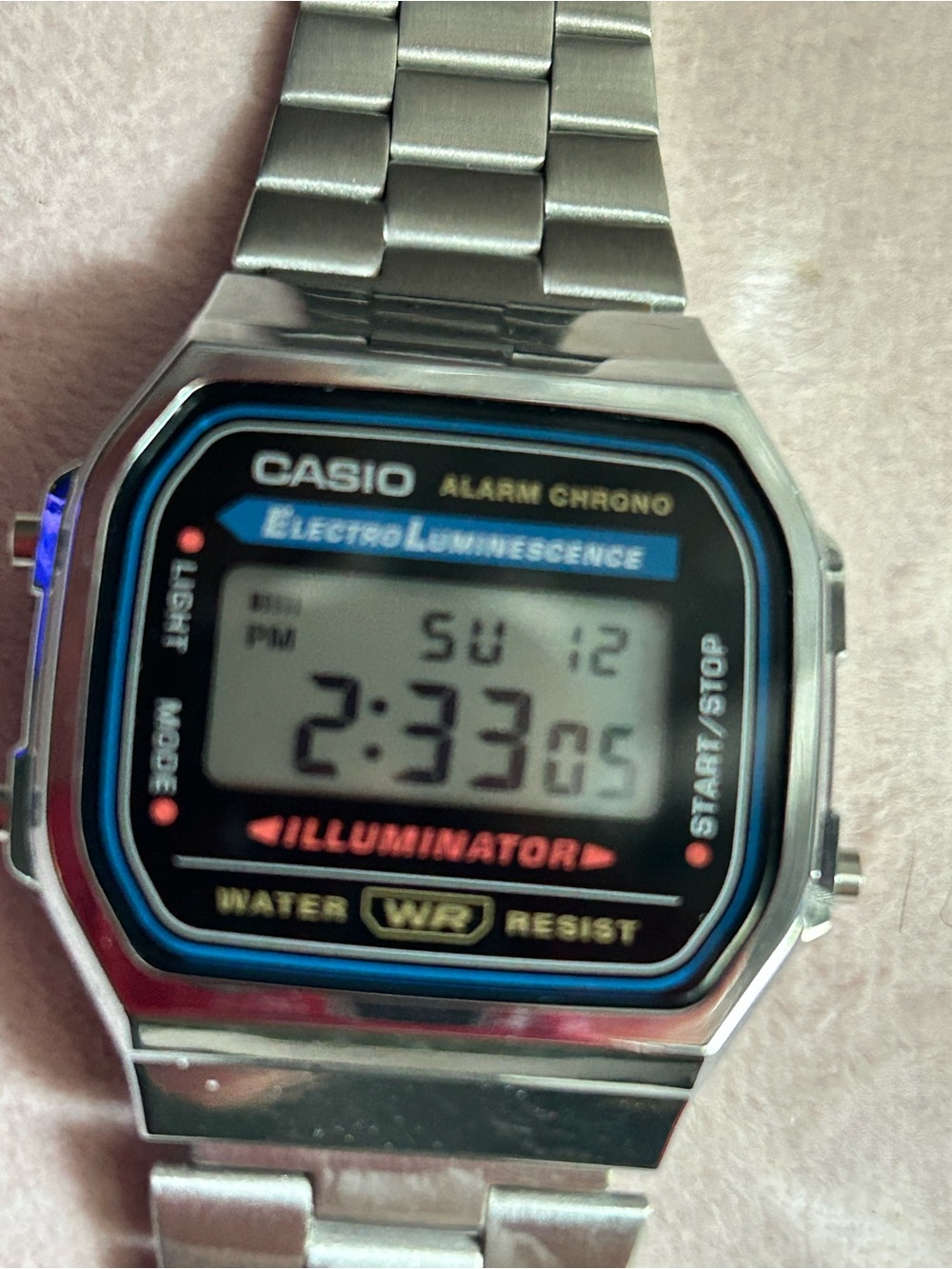 Casio Silver Digital Watch with Black and Blue Accents